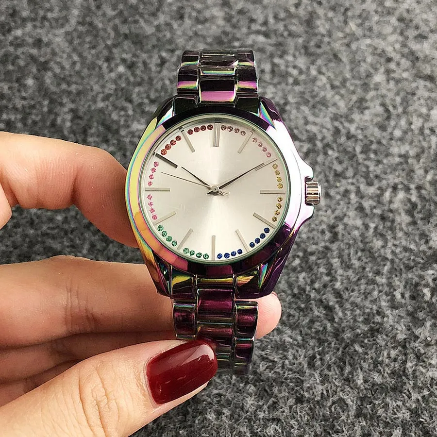 Orologio da polso al quarzo di marca donna Ragazza cinturino in acciaio metallo cristallo colorato Orologi M100