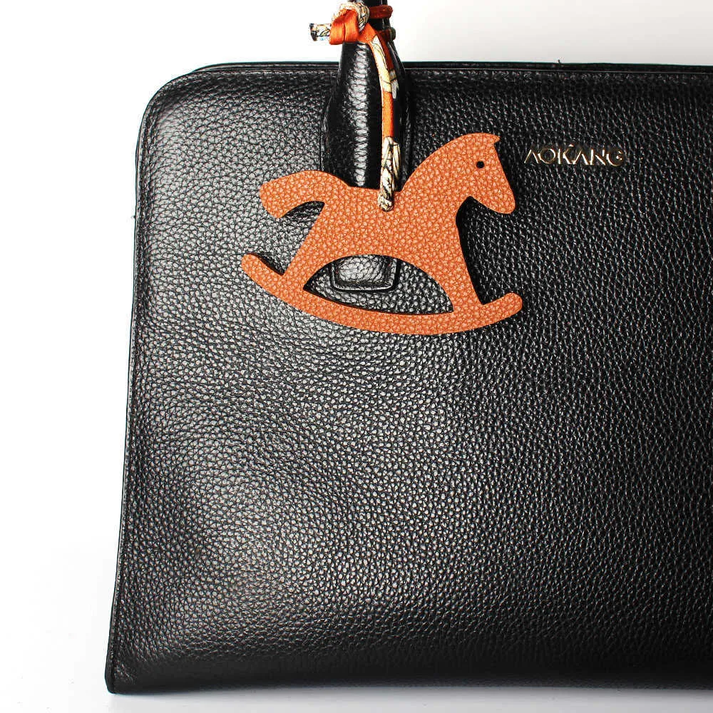 Berömd designer lyxig äkta siden äkta läder Seahorse Deer Keychain ryggsäck Pendant Animal Key Chain Women Bag Charm H0915238L