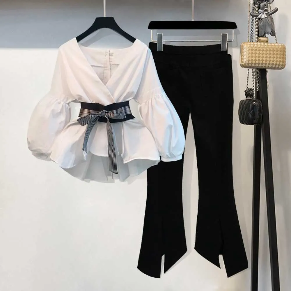 Arrivo coreano elegante OL abbigliamento da lavoro manica a sbuffo papillon camicetta a righe + pantaloni svasati divisi da donna set da 2 pezzi 210529