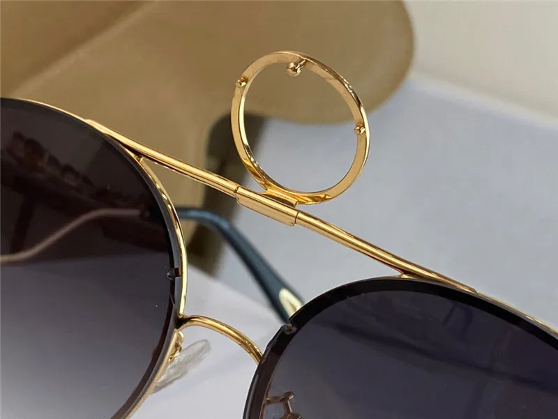 Neue Modedesignerin Frauen Sonnenbrille 145 Pilot Metallrahmen austauschbare Linsen Avantgarde Populär Style UV 400 Protect22u
