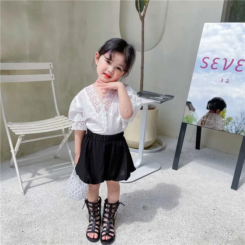 Style coréen été enfants fille 2 pièces ensembles blanc dentelle col en v chemises + noir citrouille Shorts enfants vêtements E8032 210610