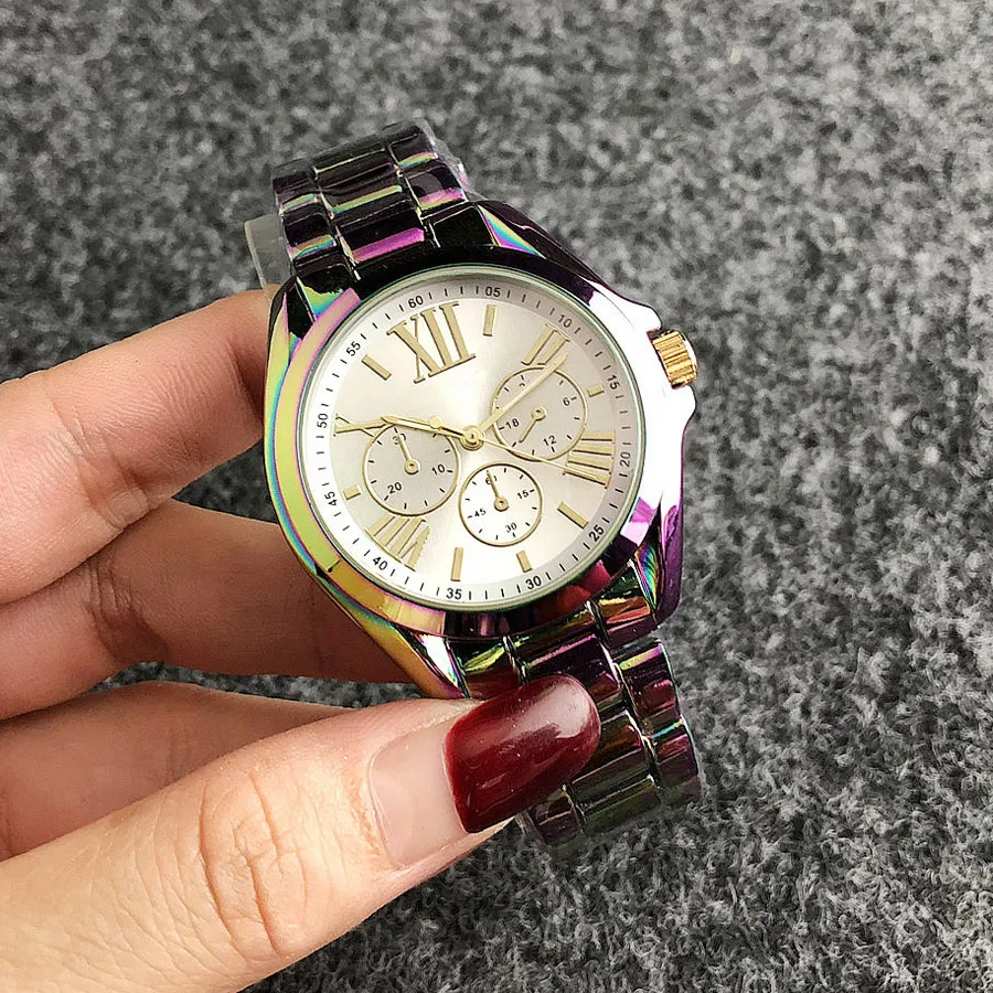 ファッションブランドの時計女性の女の子3ダイヤルカラフルなスタイルの金属製の鋼鉄帯クォーツ腕時計M97