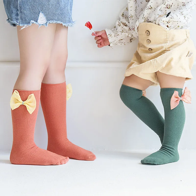 Baby knä hög långa strumpor tjejer bågar sock bomull spädbarn godis färg ben varmare för barn ribbade strumpor toddler sokken