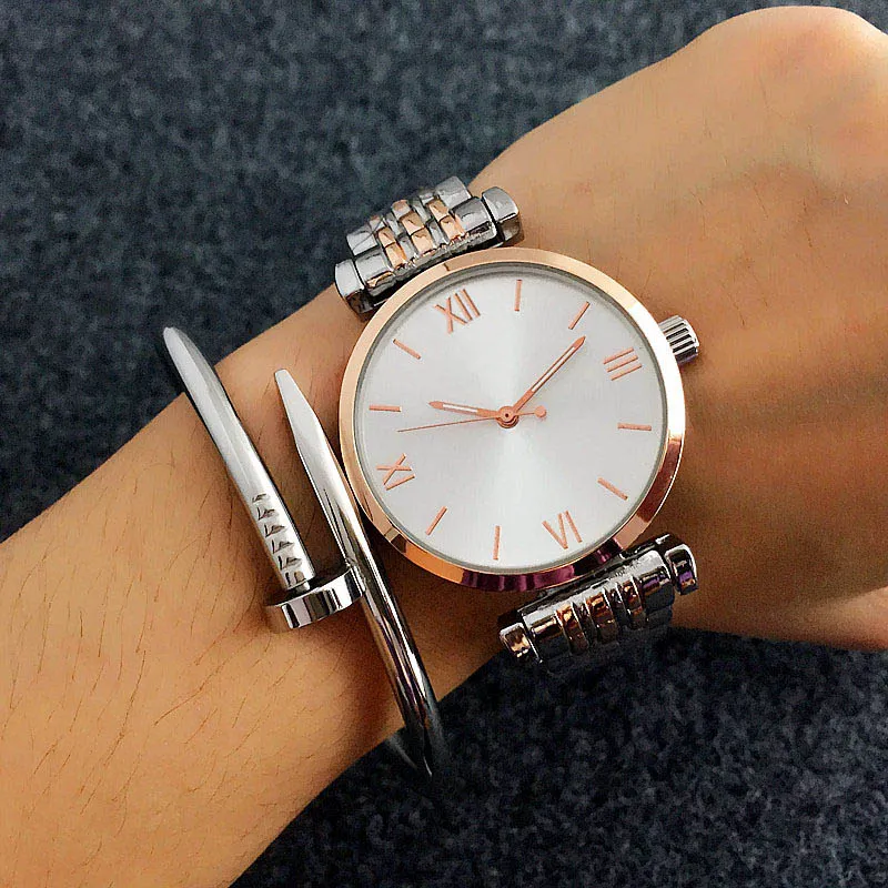 Relojes de marca de moda, reloj de pulsera de cuarzo con banda de acero y Metal para mujer y niña AR01