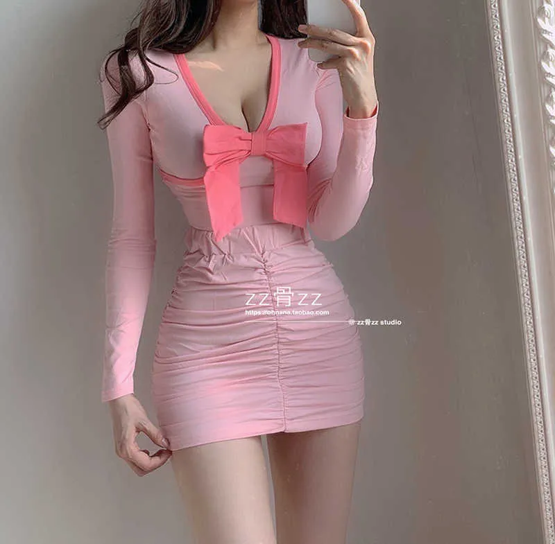 Womengaga zoete roze meisje vrouwelijke sexy vouw potlood effen kleur toont dunne hoge taille slanke heup elastische mini rok vrouwen pgir 210603