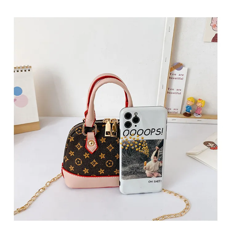 Moda niñas bolsos impresos padres niños floral mini portátil accesorios de concha mensajero bolsa niños mujeres cadena un hombro bolsos F137