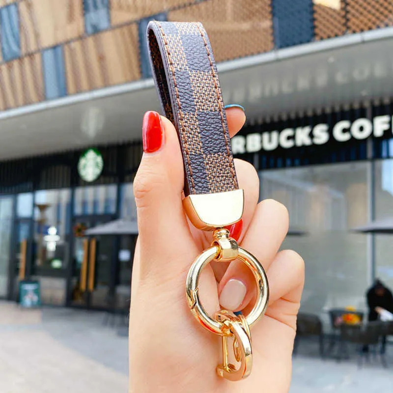2021 Luxury Men's midje Buckle Leather Presbyopia Keychain Pendant Car Key Chain Ring Fashion Par Creative Gift H10113005