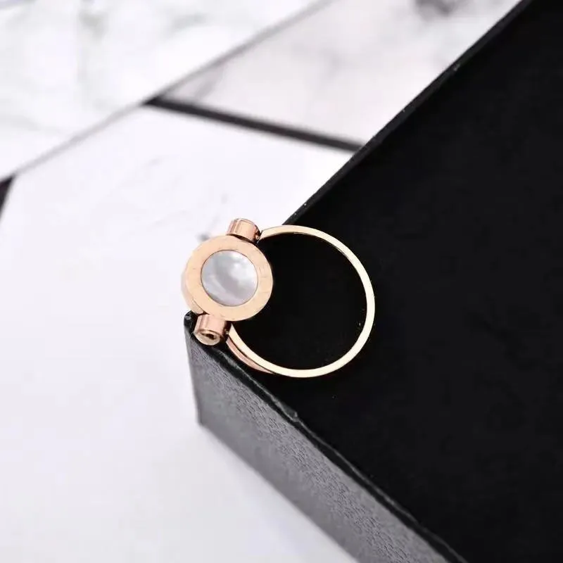 Hoogwaardige roségouden dubbelzijdige rotatie met zijstenen ringen Mode dame creatieve flip-ring Stuur originele geschenkdoos261H