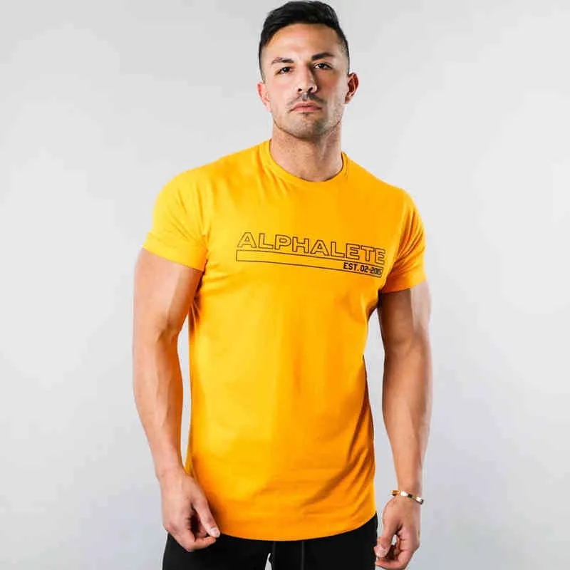 Maglietta skinny casual in cotone giallo Maglietta fitness da uomo a manica corta Maglietta sportiva da bodybuilding maschile Maglietta estiva Abbigliamento da palestra G1222