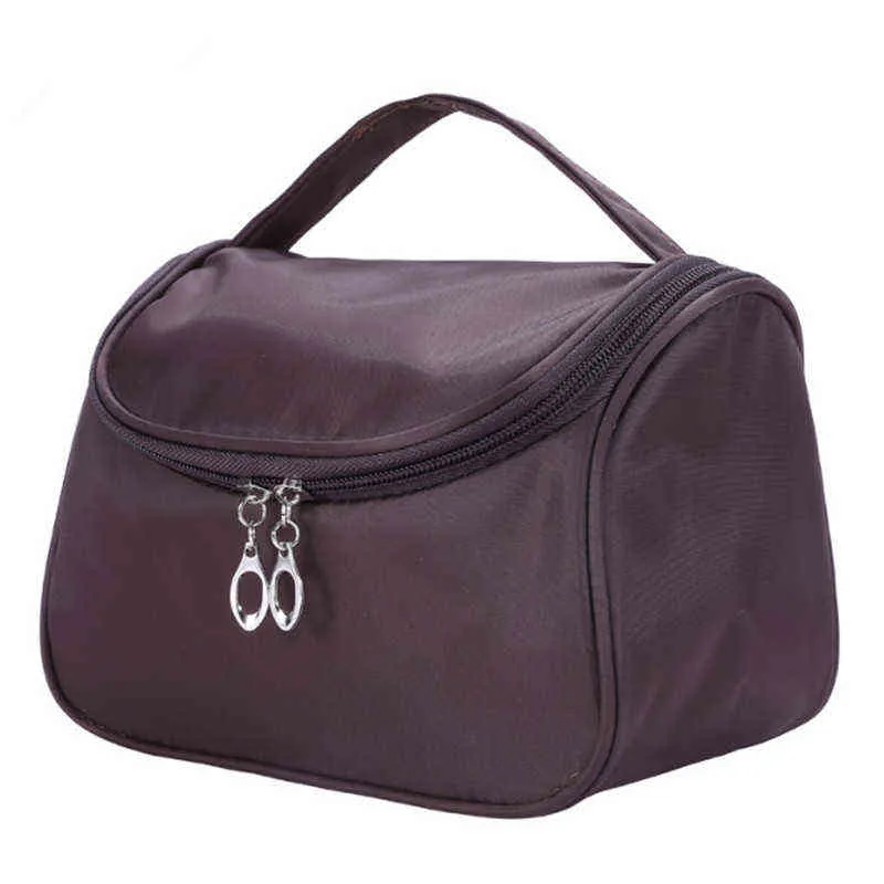 NXY Vrouwen Solid Cosmetische Draagbare Grote Capaciteit Nylon Wassen Opbergtas Voor Dames Hoge Kwaliteit Eenvoudige Designer Make Up Handtassen 220302