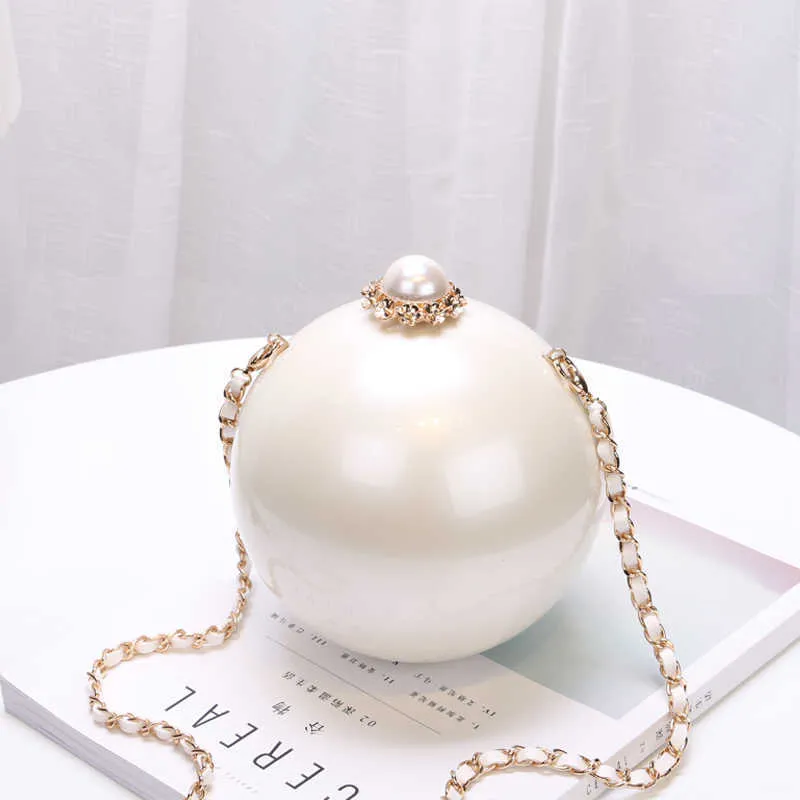 2020 Fashion Design Pearl Ball Party Bags Woman Borse Woman Borse Global Spherical Acrilico Spalla dura STAMPA CROVE BAG Q4008343