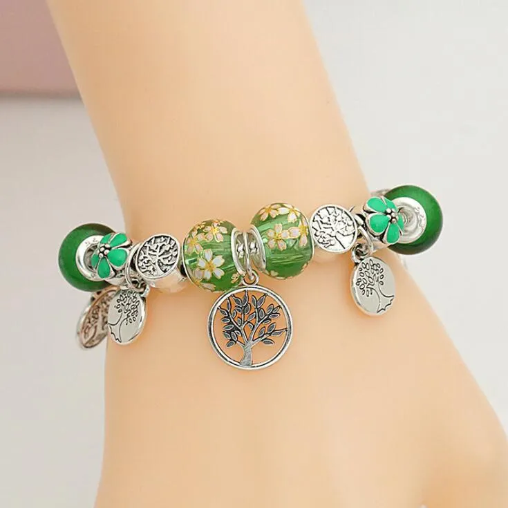 Nuovo braccialetto europeo e americano con fiori verde oliva, foresta, albero del vento, piantina, ciondolo, foro grande, perline di cristallo, argento antico B9949037