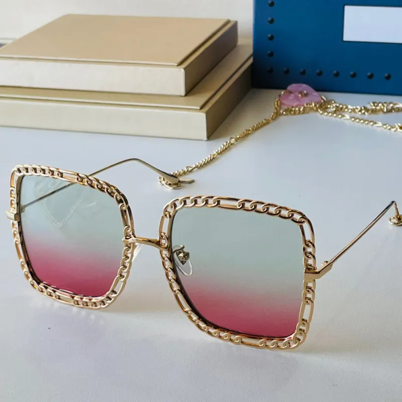 Lunettes de soleil de mode de créateurs 1033S Metal Big Frame pour femmes avec une longue chaîne détachable 2021SS Hiver Ladies Holiday Party Sun Glasses277p