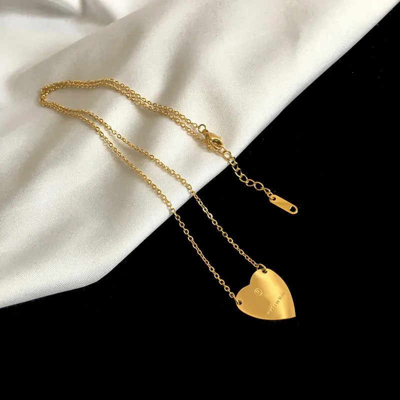 Collier de luxe femmes en acier inoxydable couple coeur chaîne en or pendentif bijoux sur le cou cadeau pour petite amie accessoires en gros