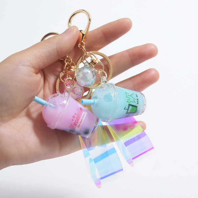 Cute Mini Bottle Keychain Diy Milk Tea Keyring Moving Liquid Bag Charm Jewelry Accessories Women Luxury Cool Gift Wholesale G1019