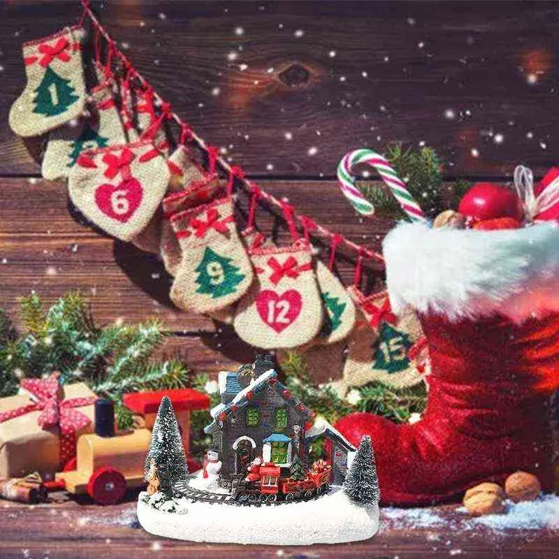 Luci a LED a colori creativi Natale Trenino Villaggio Casa Paesaggio luminoso Snow Figurine Resina Ornamento da tavolo Natale K0AB G8587884