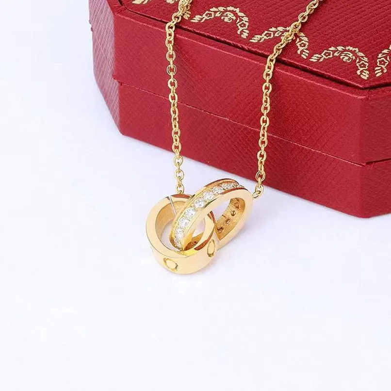 Klasyczne projektanta miłosne naszyjniki podwójne pierścień wisiorek moda błyszcząca diamentowa naszyjnik moda damska złota srebrny moment obrotowy z czerwonym pudełkiem 2195