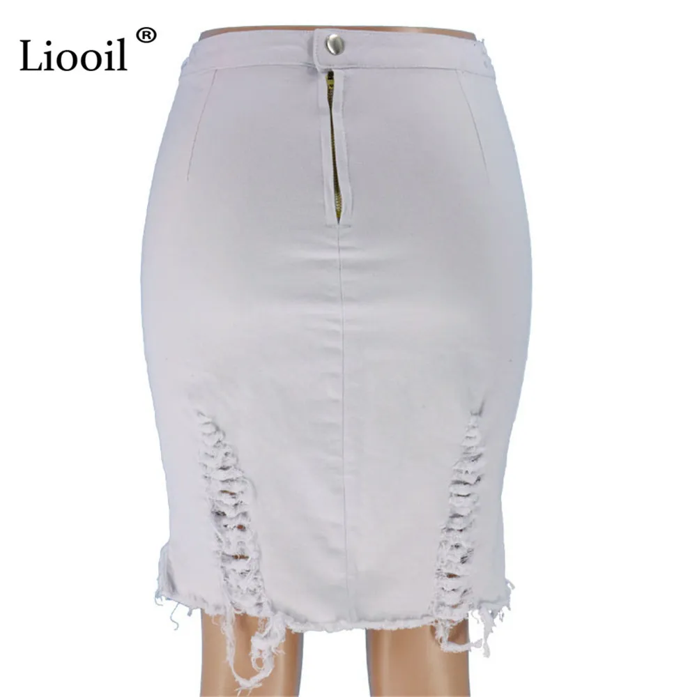 Liooil asymétrique coton noir blanc trou Denim jupe mi-longue avec gland Streetwear taille haute lavage en détresse femmes jupe moulante 210303