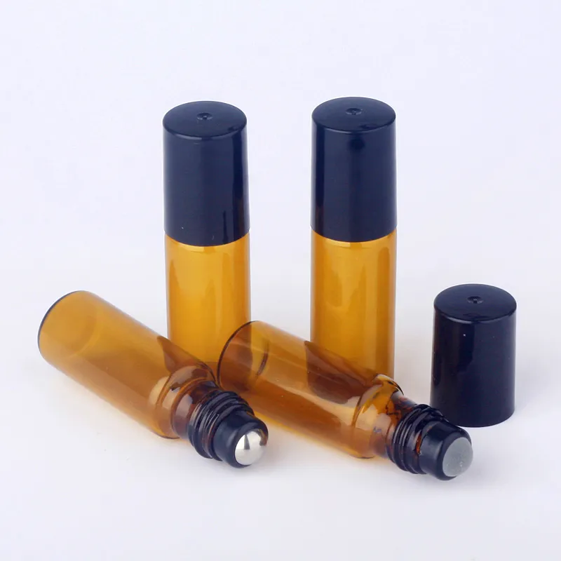 Mini rollo de 5 ml en botellas de aceite esencial Botella de bola de rodillo recargable Contenedores de aceites de perfume de vidrio marrón Logotipo de soporte de contenedor de perfume personalizado