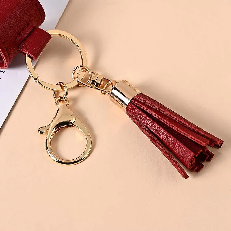 Hand Sanitizer -flaska med TASSEL KEYCHAIN ​​30ML PORTABLE TOME Återanvändbar flaska PU -läder Key Chains Holder Carriers2827442