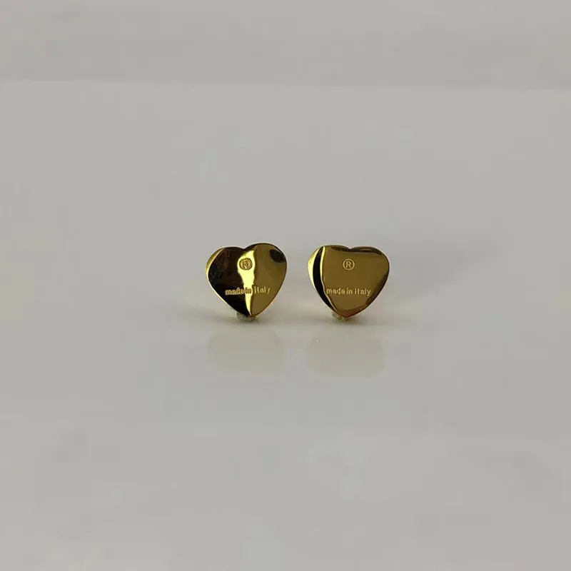 Gold Heart Oreing Femme Femmes Sac de flanelle Sac en acier inoxydable 10 mm Bijoux de corps pour femmes accessoires en gros 306v