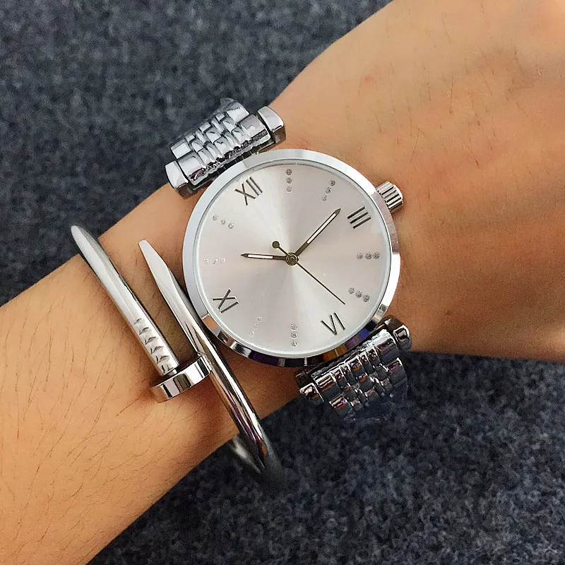 トップブランドの腕時計女性レディガールクリスタルスタイルメタルスチールバンドクォーツ腕時計 AR09