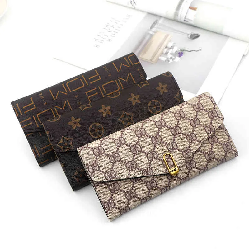 50% KORTING designer tassen Dames lange handtas mode drievoudige portemonnee kleine frisse gesp gepersonaliseerde multi-kaart nul portemonnee321U
