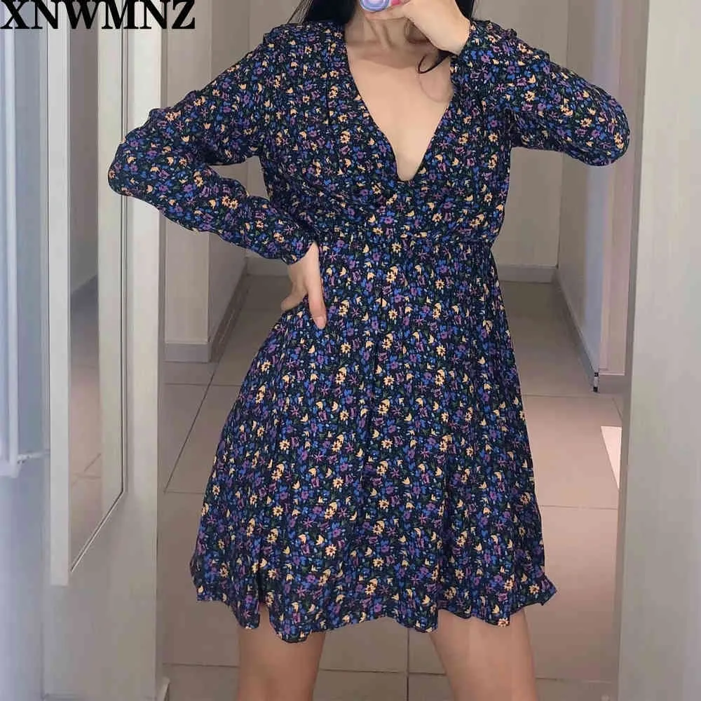 women printed dress with shoulder pads Short surplice neckline Long sleeves invisible zips Elastic waist 0003313 210520