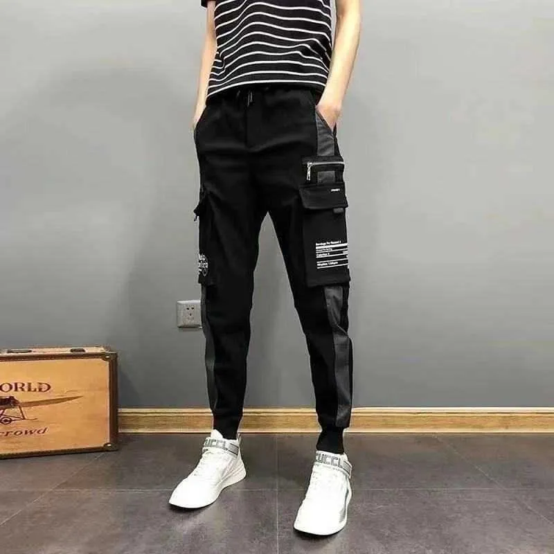 Nouveaux hommes rubans noir poche cargo pantalon 2021 mode étudiant harem joggers harajuku pantalon de survêtement hip hop pantalon décontracté y0927