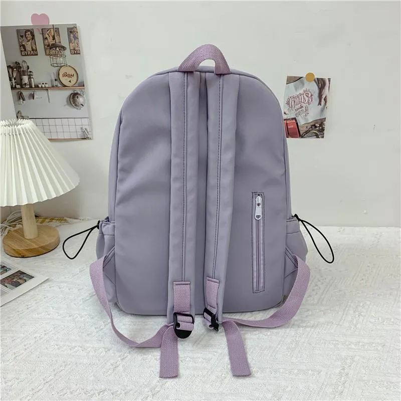 Sacs d'école couleur unie mode femmes sac à dos mignon pendentif sac pour garçons filles toile grande capacité ordinateur portable Couple sacs à dos 2021267h