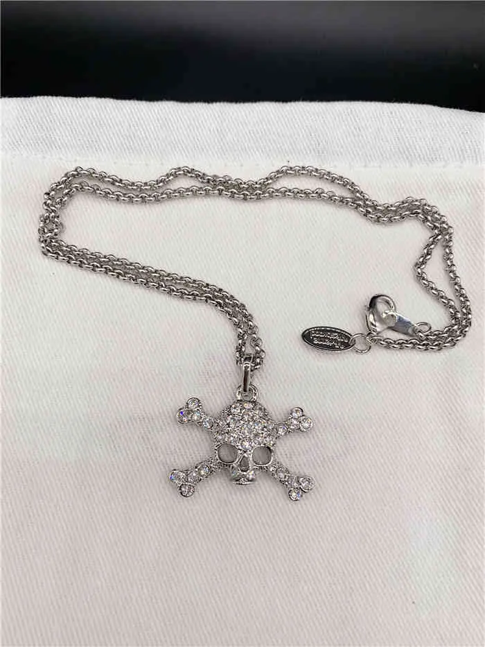 Europäische und amerikanische Mode-Gold-Silber-Volldiamant-Perlen-Kleinschädel-Doppelknochen-Saturn-Halskette