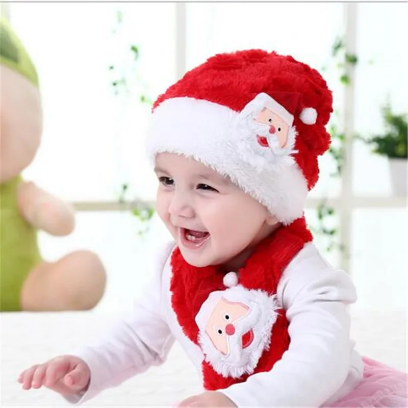 ツーピースの暖かい赤ちゃんの冬の豪華な子供の帽子とスカーフのクリスマスの帽子2-6歳