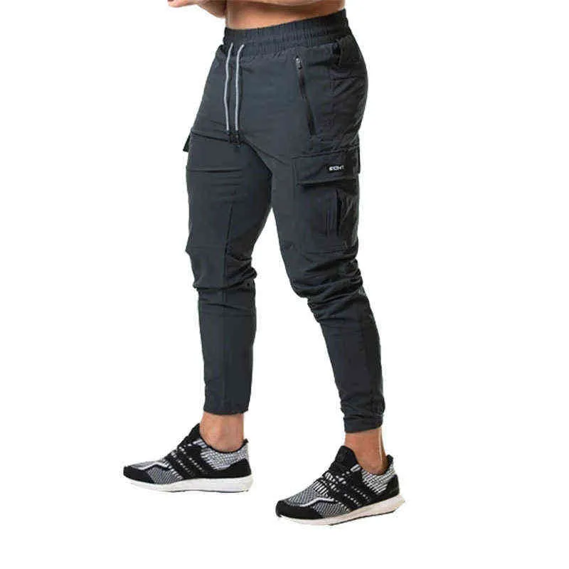 Nuovi pantaloni da jogging Tuta da uomo Pantaloni skinny casual Pantaloni multi-tasca Pantaloni da pista da uomo Palestra Allenamento fitness Bodybuilding Pantalone sportivo G0104