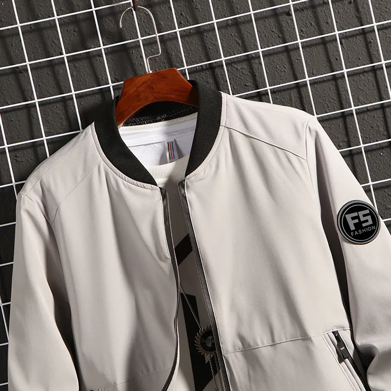 Thoshineブランド春秋の男性のジャケット薄いパッチデザインポケット男性野球のジャケット軽量のアウタートップス文字220301