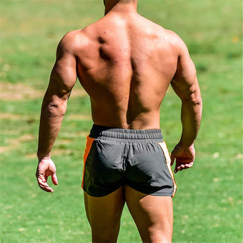 الصيف رجل السراويل الجمنازيوم اللياقة البدنية كمال الاجسام عارضة ركض تجريب العلامة التجارية الرياضية السراويل القصيرة sweatpants 210629