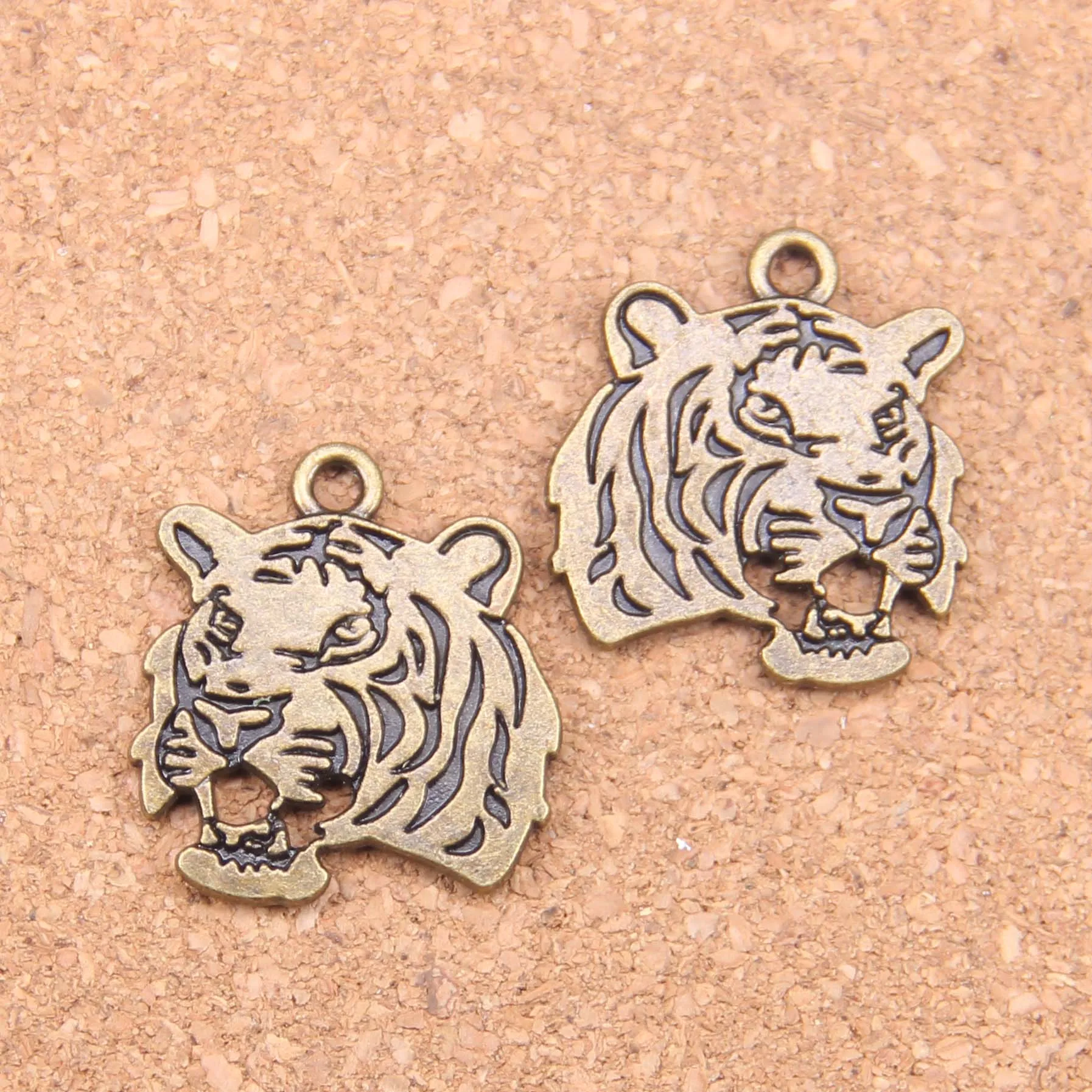 27 pezzi argento antico placcato bronzo testa di tigre ruggente pendenti con ciondoli collana fai da te braccialetto braccialetto risultati 27 24mm257S