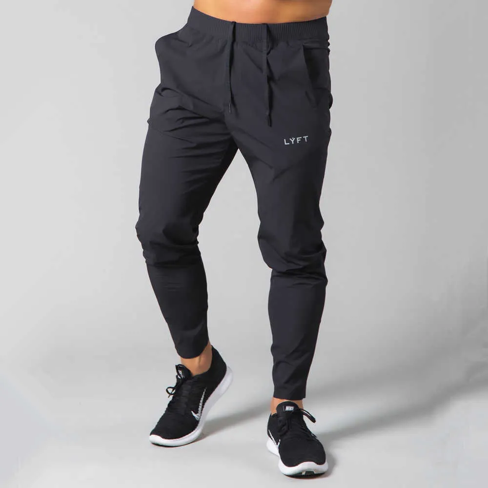 Pantaloni casual neri Pantaloni da jogging da uomo Pantaloni sportivi da corsa Pantaloni sportivi da uomo Palestra Fitness Training Pantaloni asciutti e asciutti Pantaloni Y0804