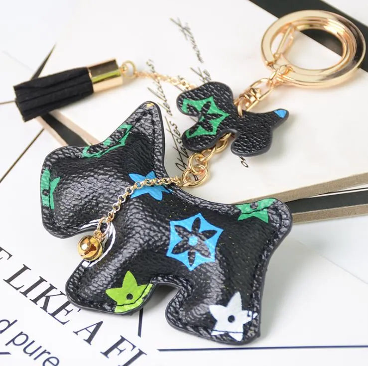Fabricant approvisionnement direct porte-clés créatif petits accessoires bagages pendentif dessin animé à carreaux chien PU cuir porte-clés 224H