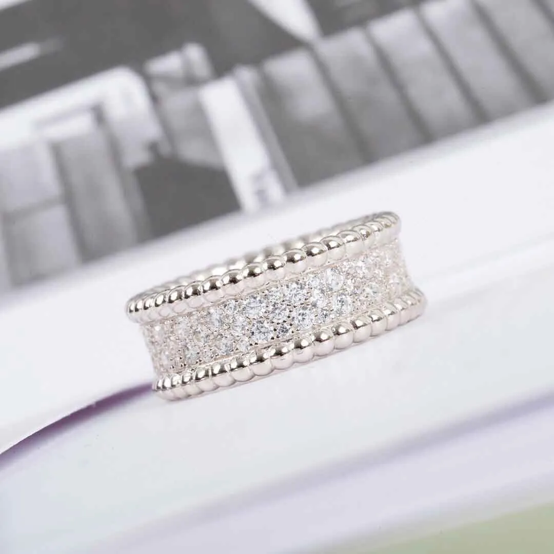 S925 Silver Top de calidad Top de calidad anillo de banda punk con diamante en tres colores plateado para mujeres Joyas de bodas Regalo tiene un sello de caja PS7287i