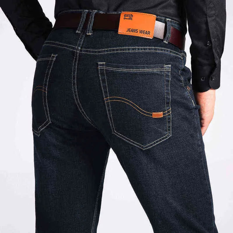 Estilo clássico estilo de negócio de marca de negócios outono moda casual estiramento de algodão slim calças denim calças masculinas preto azul 211111