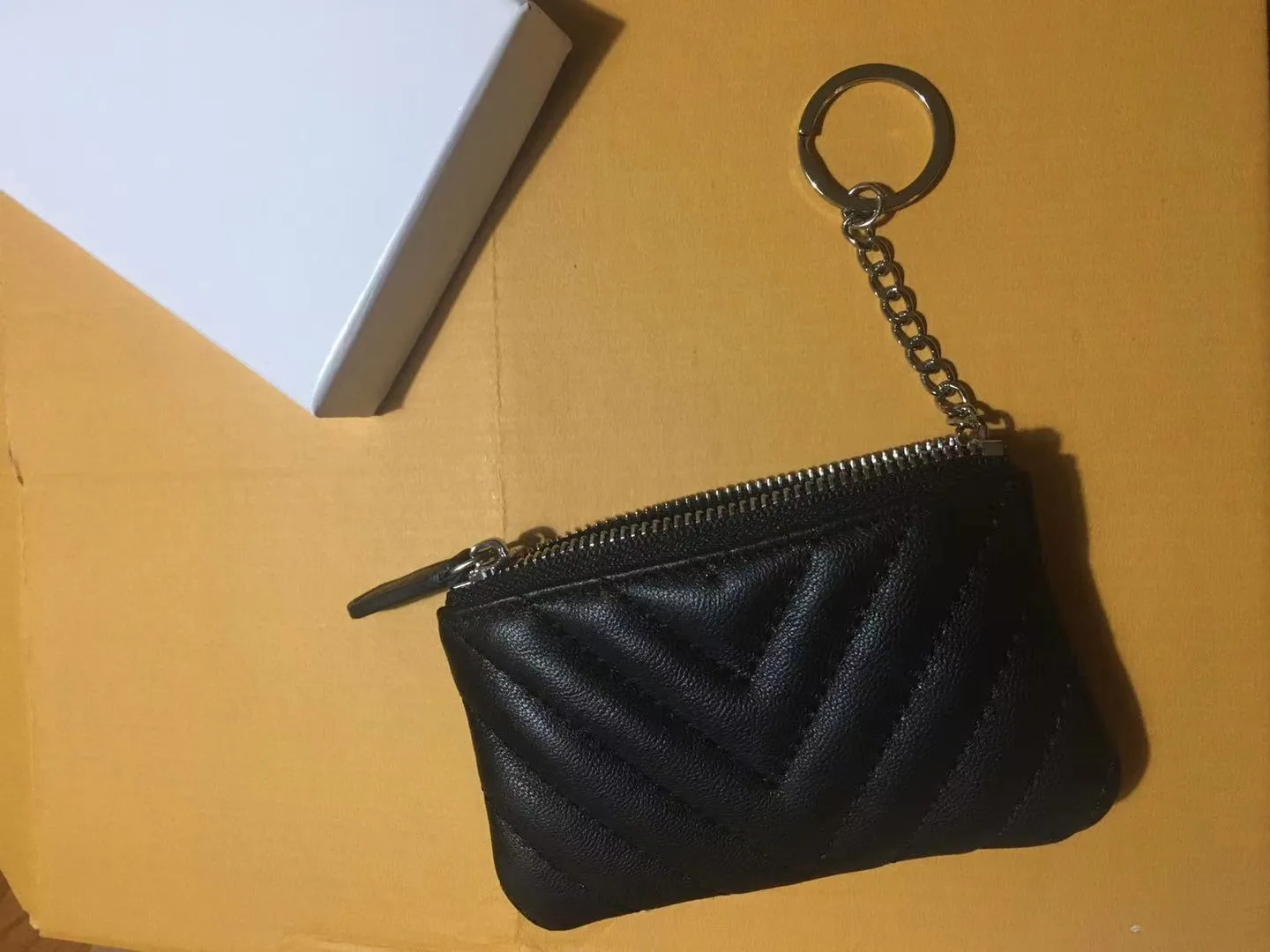 bolsa de bolsa de bolsa bolsa de moeda carteira de carteira de designer de bolsas de bolsa de bolsas de bolsa de bolsas de bolsas de carteira com caixa de pó de pó de pó de alta qualidade lamb304c