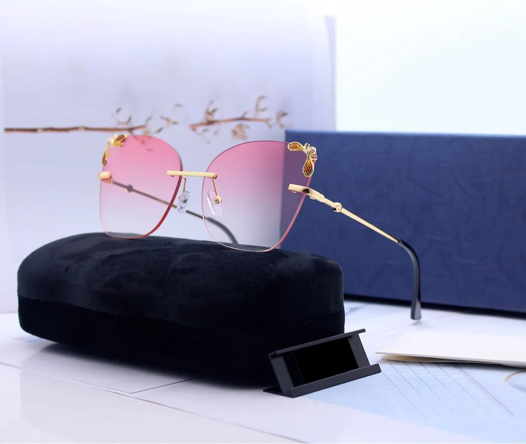 Färgglada Cat Eye -ramlösa designer solglasögon med bi fäst vid linsmode Sungasse för att köra sommaren2545