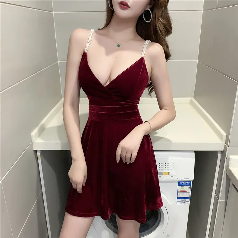 2021 summer new Korean version of the waist was thin and sexy V-neck low-cut backless pearl strap dress women X0521