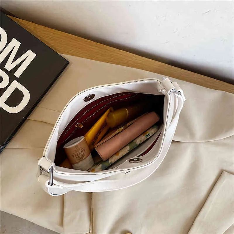 62٪ خصم جودة عالية مخصصة من منتجات الأزياء الشارع بلون حقيبة صغيرة مستديرة ربيع جديد بسيط بسيط كتف رسول حقيبة {فئة}