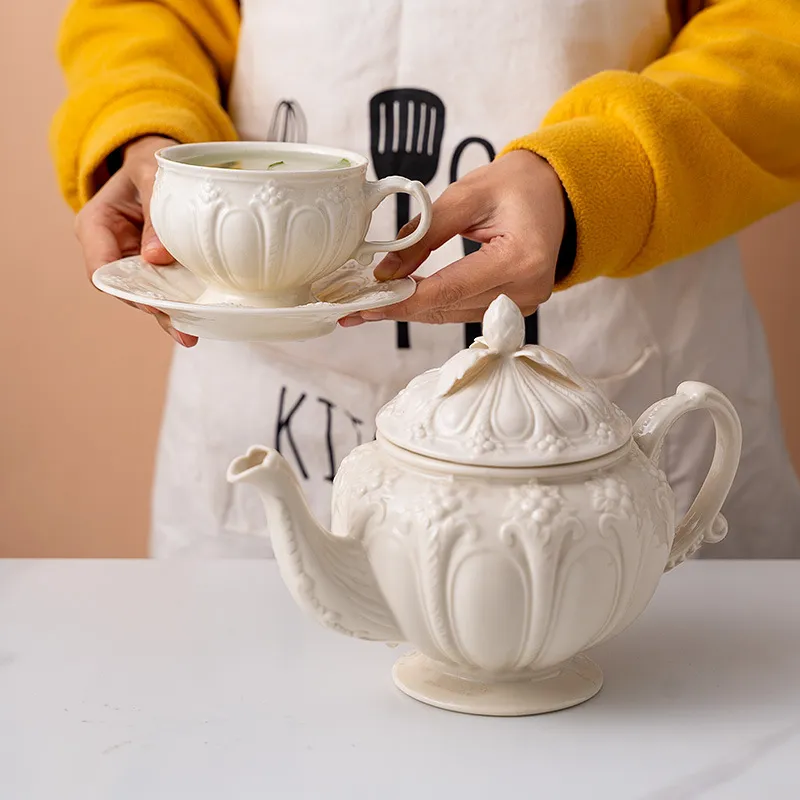 Piattino tazza di caffè in ceramica goffrata al latte Creativo europeo tè pomeridiano Teiera Tazza da tè Semplice porcellana bianca213W
