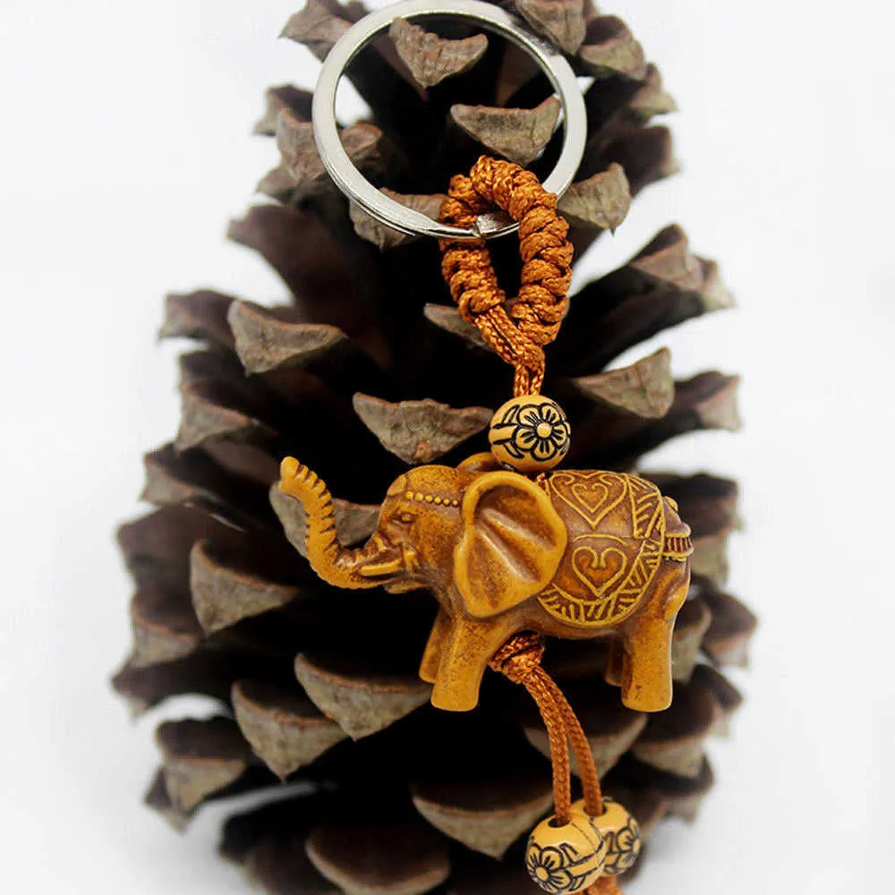 Porte-clés éléphant en acier inoxydable, 1 pièce, sculpture sur bois de pêche, Unique pour offrir des cadeaux, Pom mignon, G1019