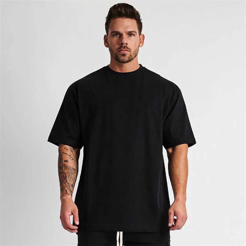 T-shirt oversize solida T-shirt da uomo Bodybuilding e fitness T-shirt casual da palestra T-shirt da uomo streetwear allentata T-shirt hip-hop 210726