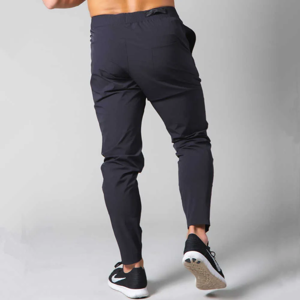 Pantaloni casual neri Pantaloni da jogging da uomo Pantaloni sportivi da corsa Pantaloni sportivi da uomo Palestra Fitness Training Pantaloni asciutti e asciutti Pantaloni Y0804