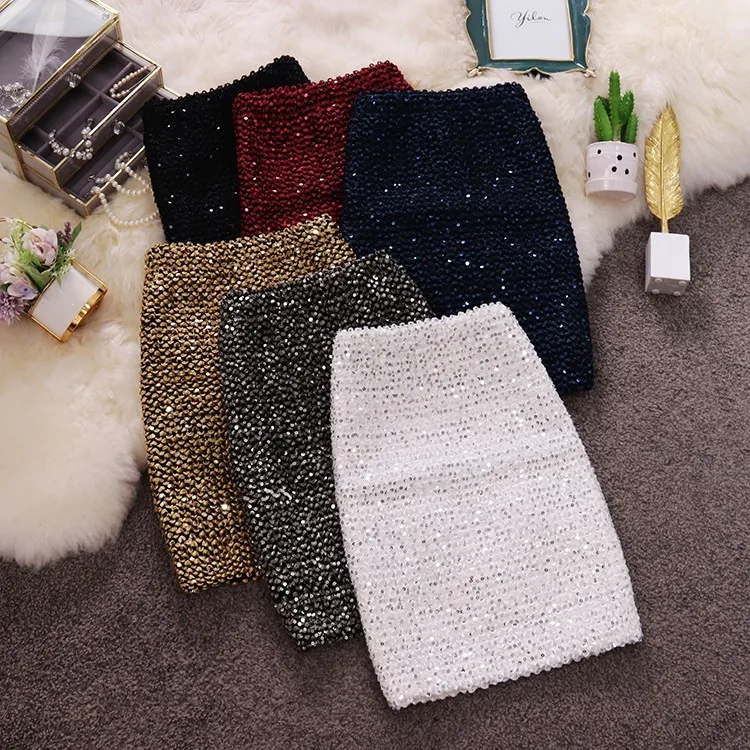 Sexy mini skirt autumn new high waist slimming fish scale sequin skirt elastic bag hip short skirt women korean style women X0428