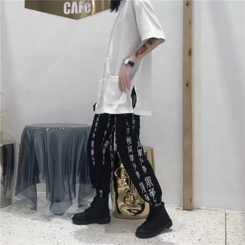 Harajuku Calças Mulheres Elásticas Cintura Moda Caráteres Chineses Impresso Solto Bezerro-Comprimento Pant 210925
